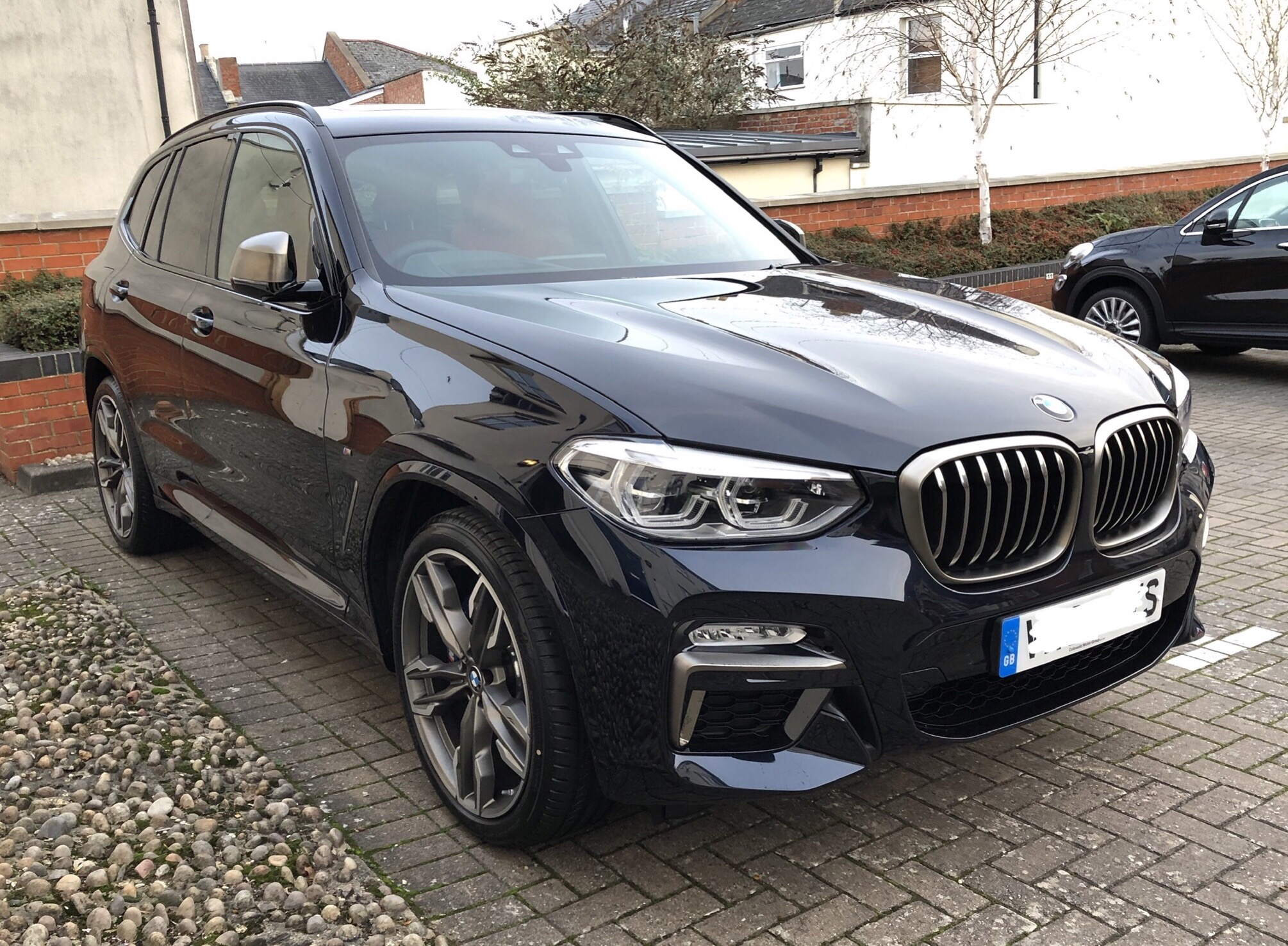 She S Here M40i Carbon Black With Fiona Red Interior