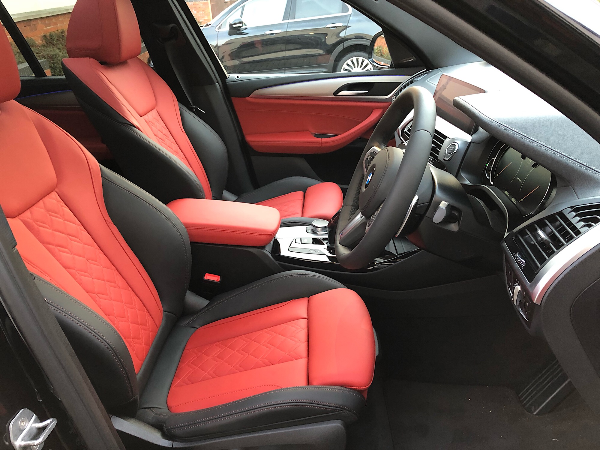 She S Here M40i Carbon Black With Fiona Red Interior